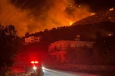 Tourists flee as Turkish luxury hotel resort goes up in flames in dramatic footage