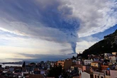 Huge Mount Etna eruption triggers red alert as plumes of smoke tower over volcano