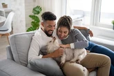 Millions of Brits stay in unhappy relationships because of puppy love