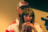 Taylor Swift makes her first appearance as a soon-to-be-sports WAG