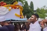 BREAKING Air India crash survivor carries brother's coffin at funeral in chilling scenes
