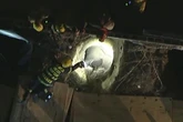 Police chase suspect falls down 30-foot hole at building site and is 'critical'