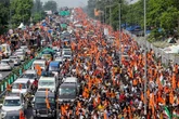 At least 6 killed and dozens injured in staircase stampede after huge crowds gather