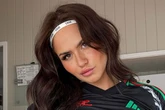 'Arsenal’s biggest female fan' paints body in away kit as supporters have to look twice
