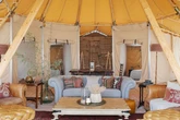 Inside Glastonbury's posh £30k glamping tent costs – with pool and helicopter rides