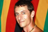 Horror final moments of tour guide mauled to death by lion as he protected those on trip