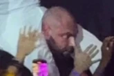 Akon security guard mounted and pounded on mid-concert by rapper speaks out
