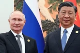 Putin 'seeks urgent talks' with Trump as Russia and China hold huge war games event