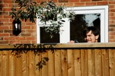 'My kinky bloke spies on our neighbours' romps and wants to watch me bonk strangers'