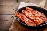 Boffins demand ban on mass-produced bacon after 50,000 Brits develop cancer