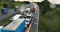 LiveM6 traffic LIVE: Motorway closed as overturned lorry catches on fire