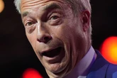 Bungling heckler shouts ‘w*****’ at Nigel Farage out of window then instantly crashes car