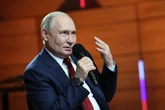 Vladimir Putin flaunts £1,000 Swiss smart watch as he turns ditches Russia's own brands