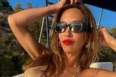 Myleene Klass slips into tiny gold bikini as fans beg her to play next Bond girl