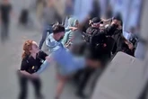 Jury shown CCTV footage of alleged assault on police at Manchester Airport