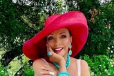 Joan Collins, 92, looks sensational in white swimsuit for age-defying snap