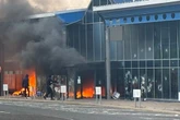 Riot police at leisure centre blaze after 'masked thug's' cause disorder in UK town