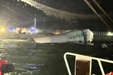 Hong Kong airport tragedy as plane skids off runway and crashes into sea