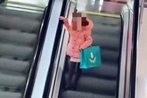 Viral 'pink hair girl' causing 'chaos' on escalators sees UK shopping centre issue statement