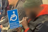 Shocking moment man openly smokes 'crack pipe' in packed London Underground carriage