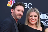 Kelly Clarkson's ex husband was in 'loving relationship' with her former assistant