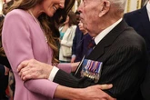 Princess of Wales hugs George Cross hero Tony Gledhill at Queen's centenary