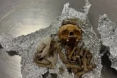 Airport staff make grim find as man caught with human skull and bones in suitcase