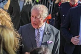 King Charles confronted by furious protester demanding answers on Prince Andrew