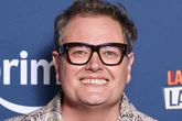 Alan Carr opens up on hidden health condition that creates iconic voice