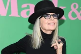 Diane Keaton's tragic reason behind always covering neck up and wearing hats