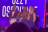 Kelly Osbourne breaks down in tears as she accepts award for late dad Ozzy