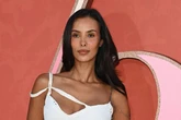 Maya Jama's dress slips off famous curves as cut-out details expose more skin