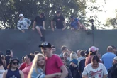 Ticketless Oasis fans clamber over Heaton Park fences in desperate bid to see show