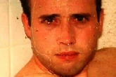 Haunting photo shows man taking shower two minutes before he was stabbed 27 times