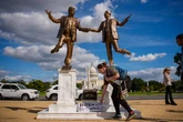 Iconic Trump-Epstein friendship statue reinstated after being toppled by supporters