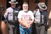Parents arrested after five kids found 'locked in dungeon' with cameras monitoring them