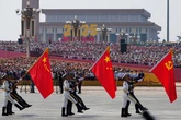 China shows off new missiles, drones and fighter jets in massive military parade