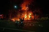 Brits caught in deadly Bali riots as violent street battles leave seven dead