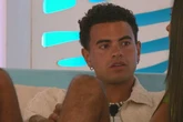 Love Island's Harrison Solomon handed bizarre gift from cast after quitting show