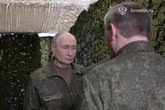 Glum Vladimir Putin looks utterly baffled as he gets stuck in strange camouflage bunker tunnel