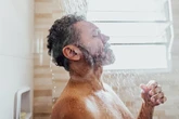 UK households lose millions by letting showers run unnecessarily, survey finds