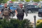 'Multiple people shot' after gunman opens fire at shopping mall as armed police swarm scene