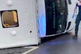 Patient dies after ambulance overturns in Glasgow crash with three medics injured