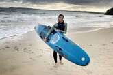 Girl, 13, paddleboards to school every day and even gets stung by jellyfish on the way