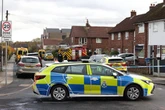 Armed police shutdown UK street as homes evacuated with emergency services on scene