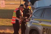 Major airport on lockdown as 'dark figure' spotted on runway before vanishing down drain