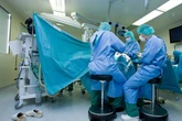 Brain surgeon arrested after 'letting daughter, 12, drill into patient's skull'
