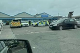 Woman arrested after axe alert saw UK schools placed in lockdown