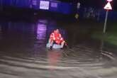 Bloke goes for a row in inflatable chair on flooded street - 'It was just a bit of fun'