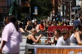 Over 670 schools close as UK heatwave rises after Met Office red weather warning - full list